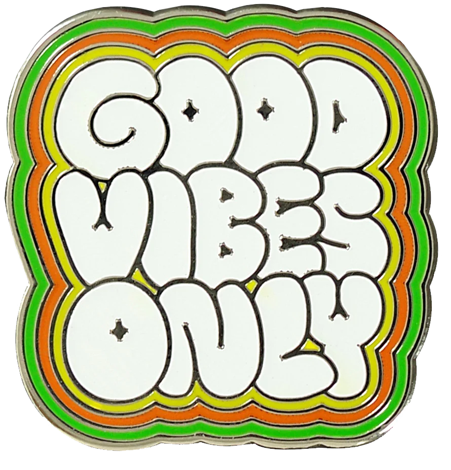 Puffy, vintage, white text that says Good Vibes Only with a green, orange, and yellow border