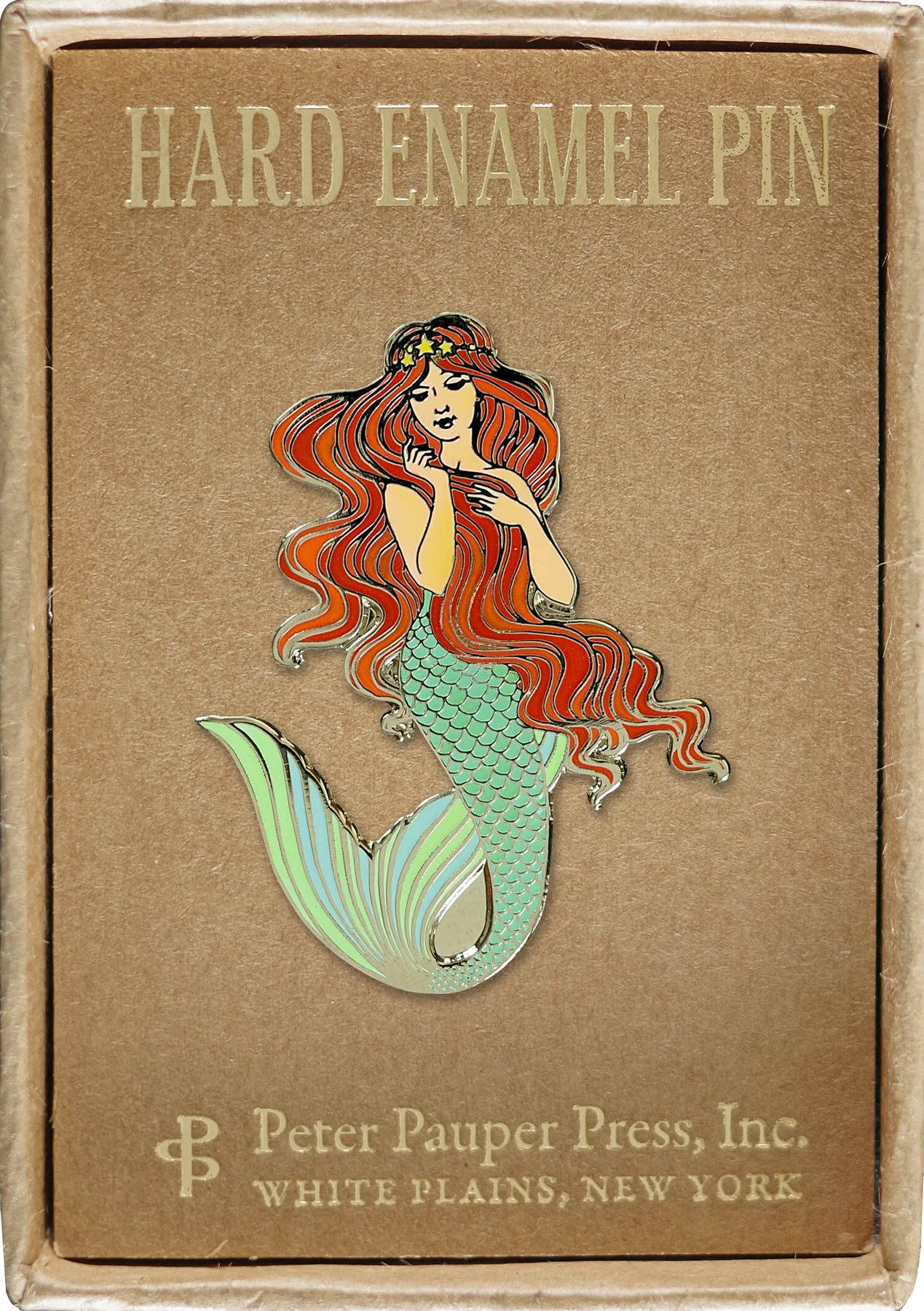 fair skinned mermaid with red hair gold crown, and a green tail attached to a box that reads hard enamel pin