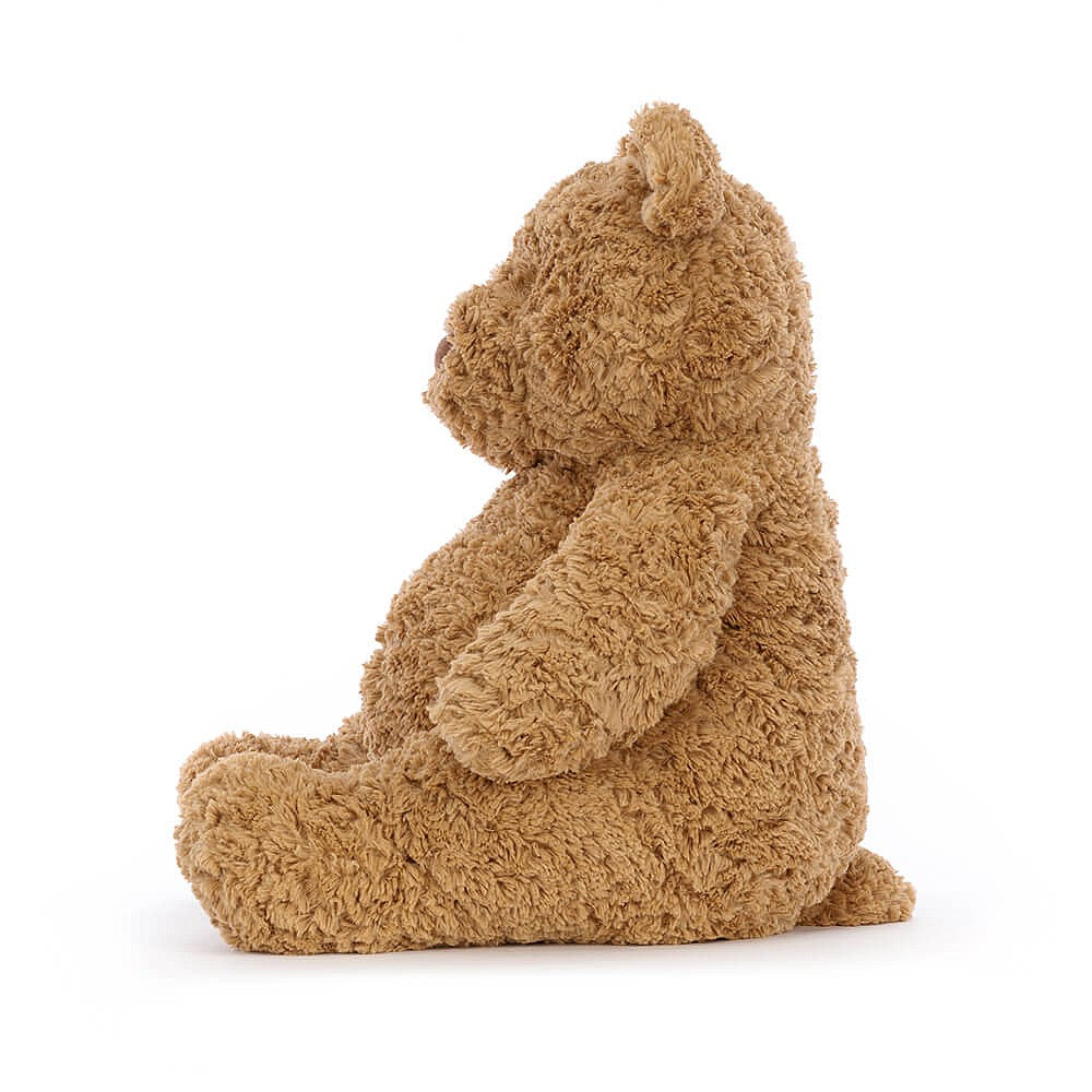 side view of a light brown plush bear