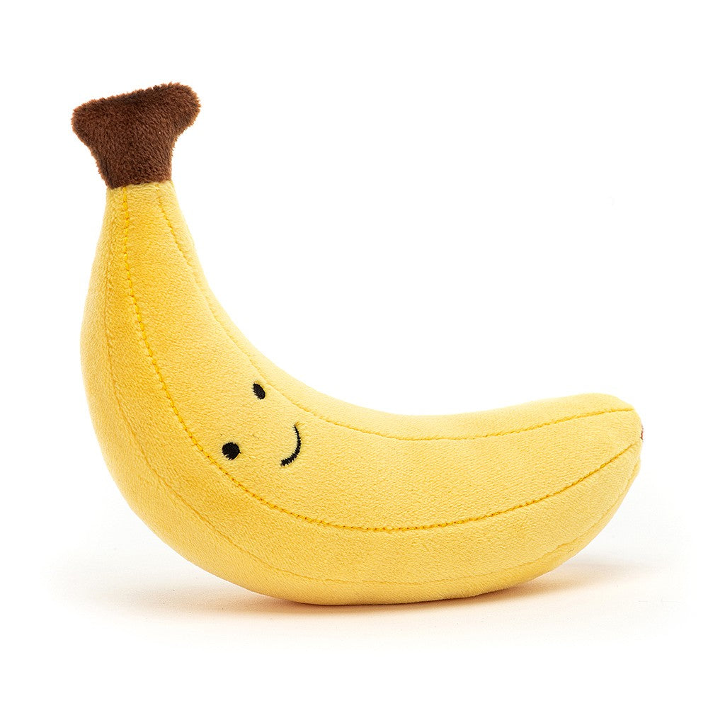 Smiling plush yellow banana with a brown stem