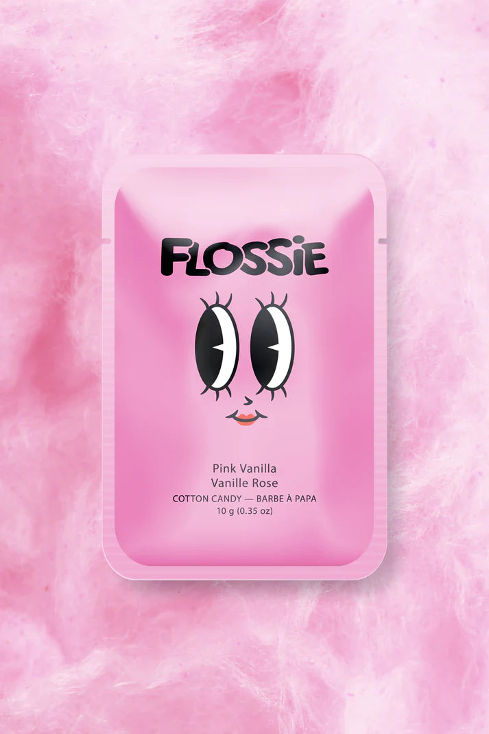 pink rectangular packaging with the text "flossie", and a cartoon smiling face