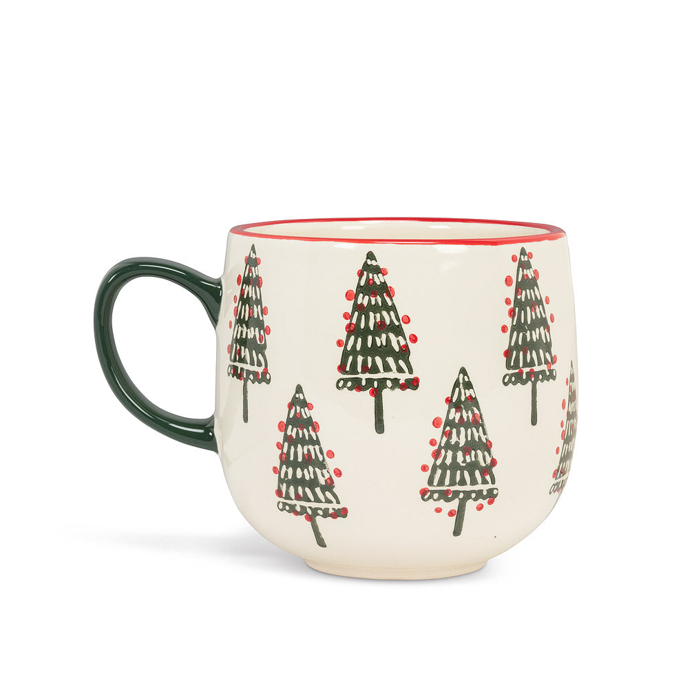 White round mug with a red rim and black handle, with painted christmas trees in a pattern