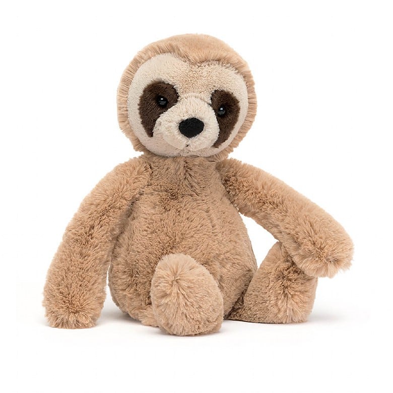 plush light brown sloth with an off-white face, and brown circles around the eyes