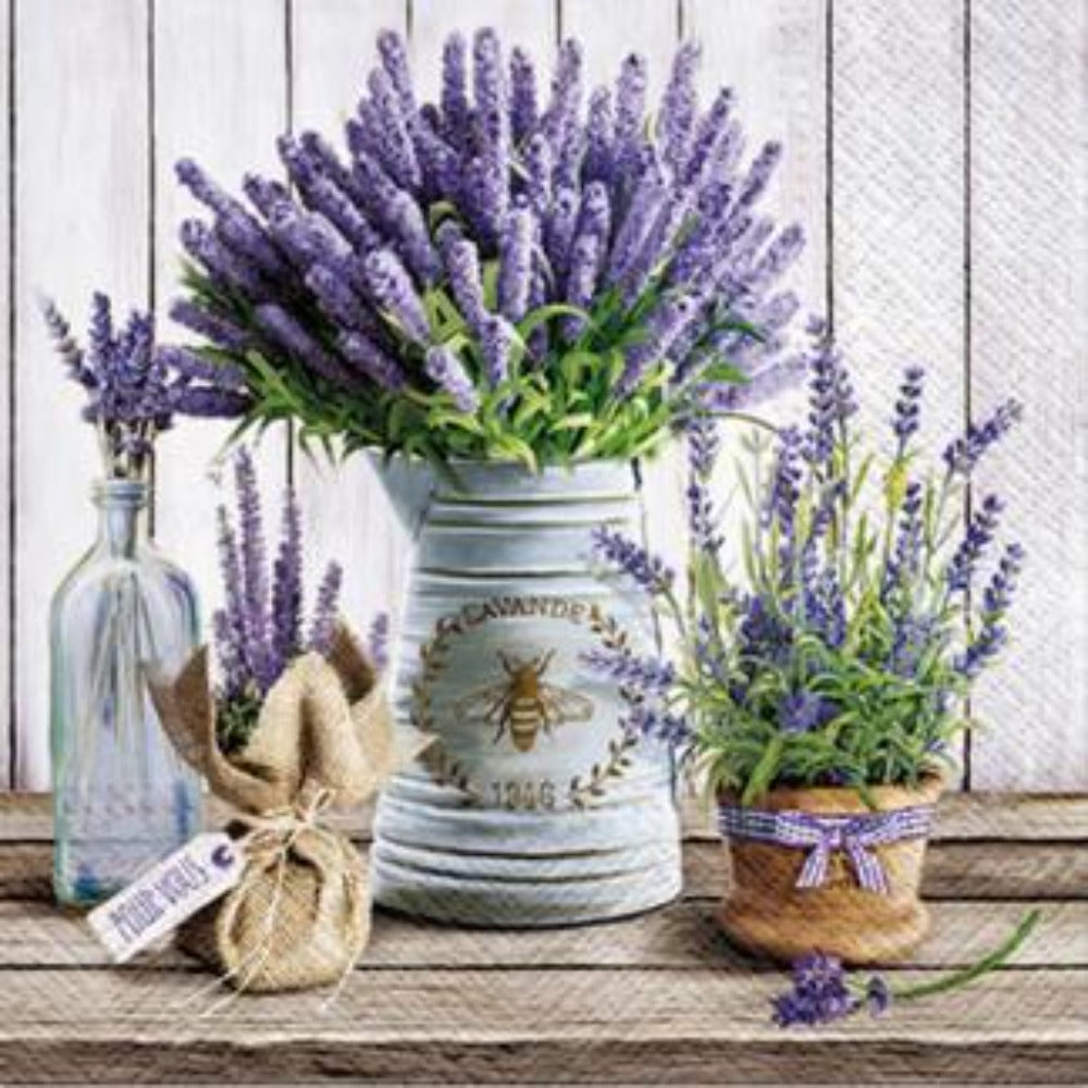 Napkin with white baseboards, a wood desk, and various pots full of lavender 
