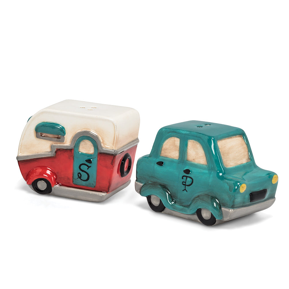 Salt and pepper shakers in the shape of a blue car, and a vintage red and white camper