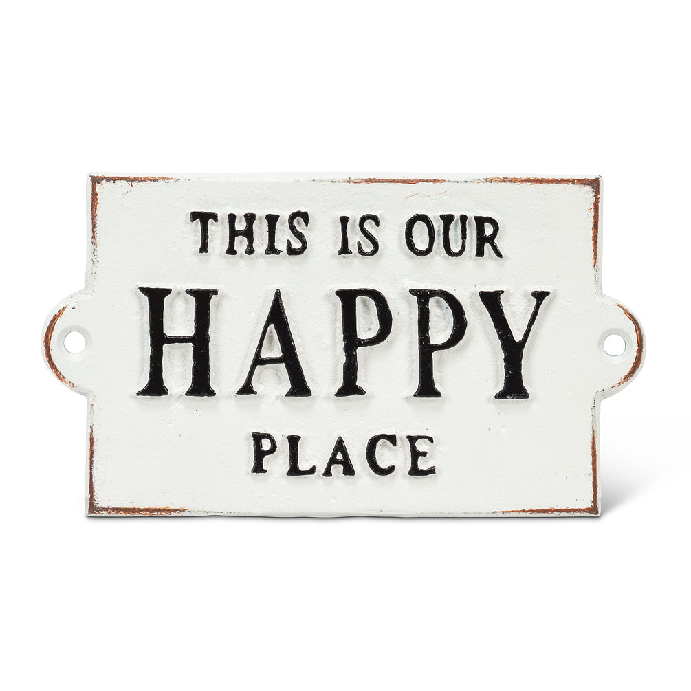 White metal vintage sign with black font that says this is our happy place