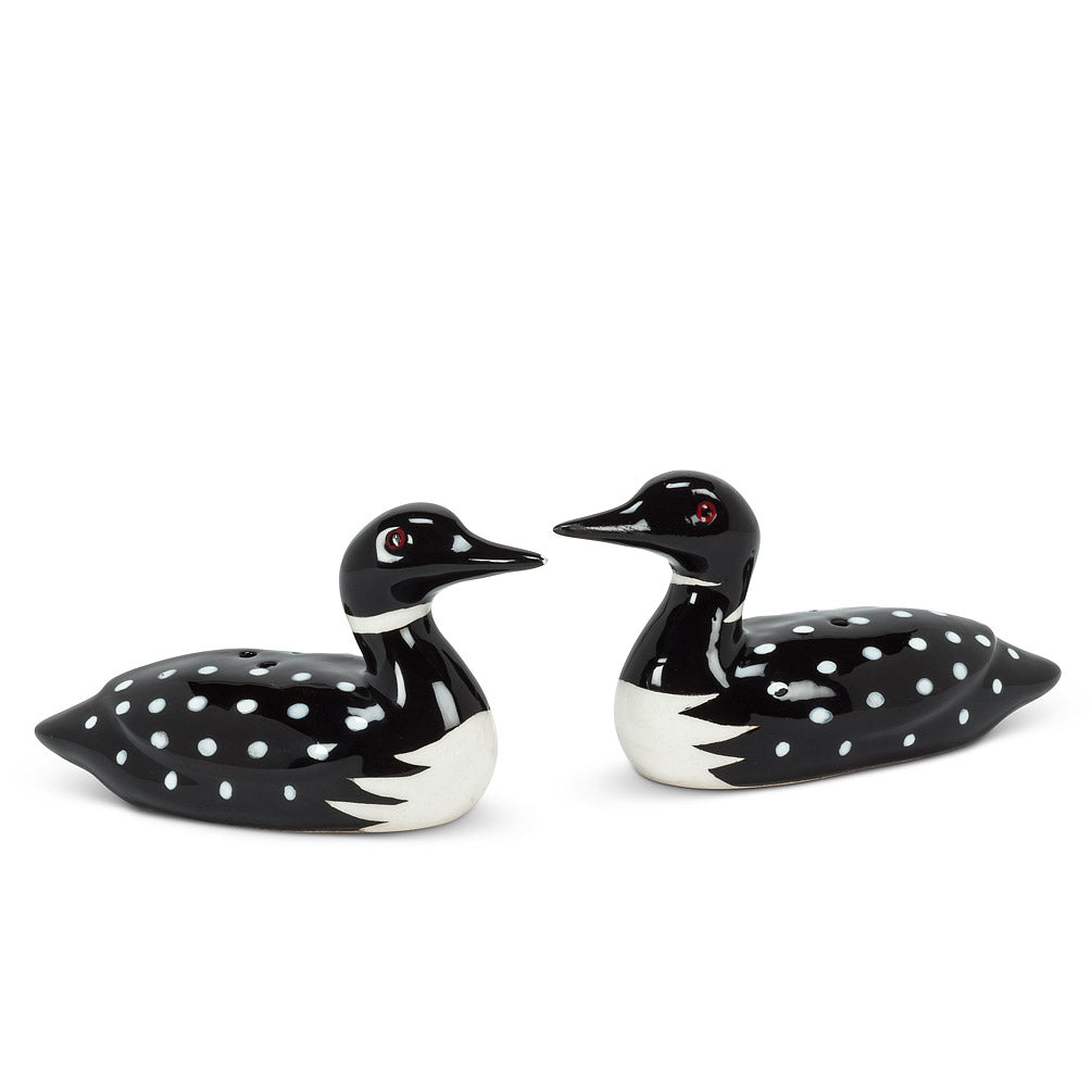 two salt and pepper shakers in the shape of loons