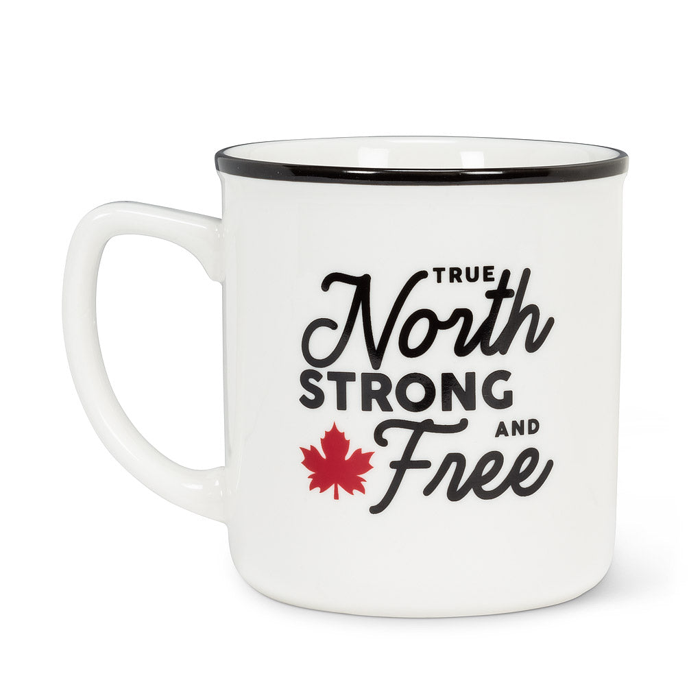 white mug with black rim, and text that says "true north strong and free" with a red maple leaf beside it 