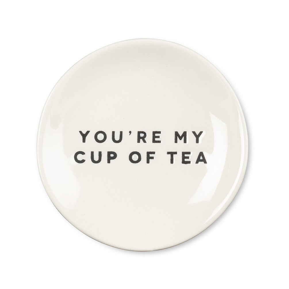 round white dish with black modern font that says you're my cup of tea 
