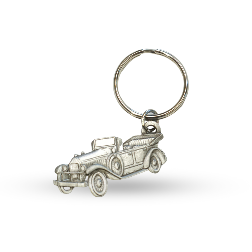 Silver keychain in the shape of a 1920's Mclaughlin Buick