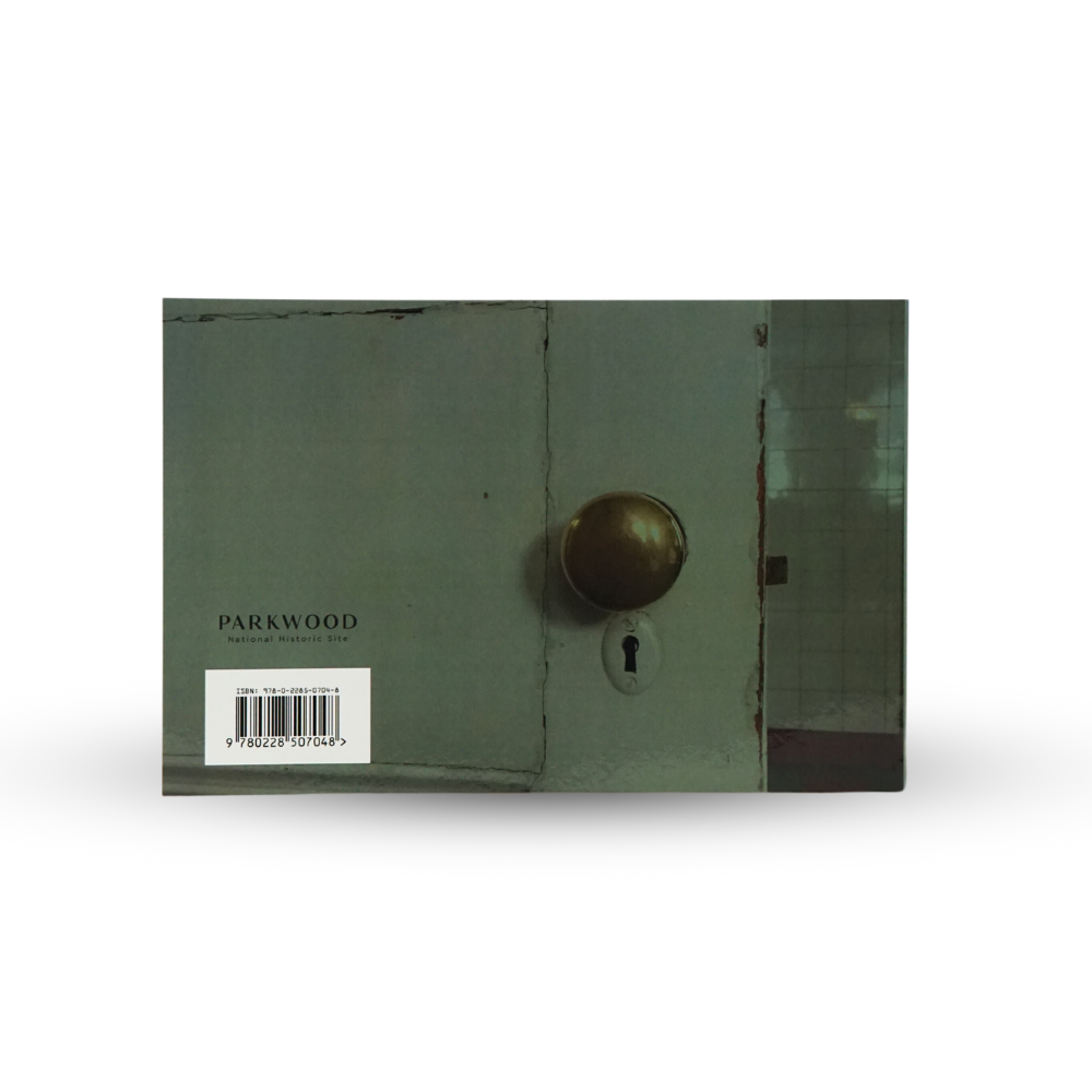 The rear cover of the book showing a green door with a brass doorhandle and a classic keyhole