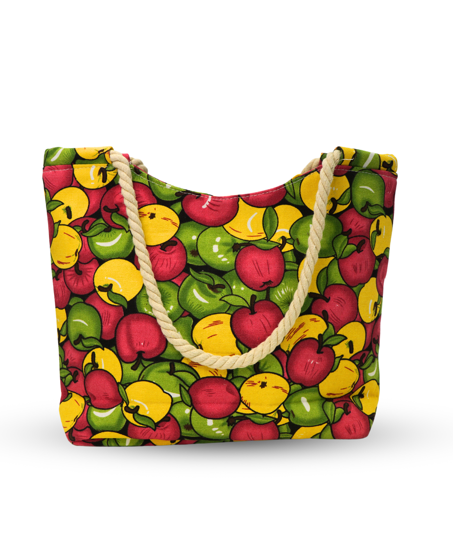 Canvas tote bag with a print of a large amount of green, red, and yellow apples