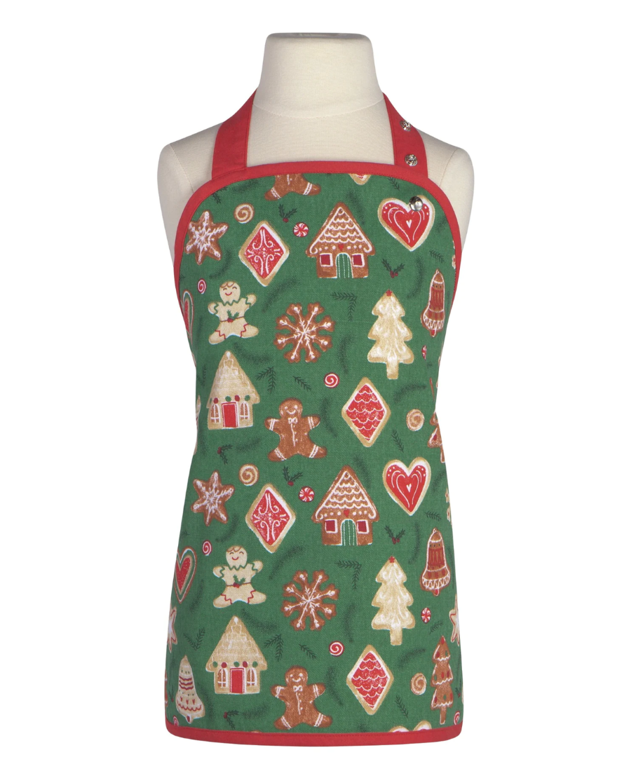 Red and green apron with mitletoe and various christmas cookies