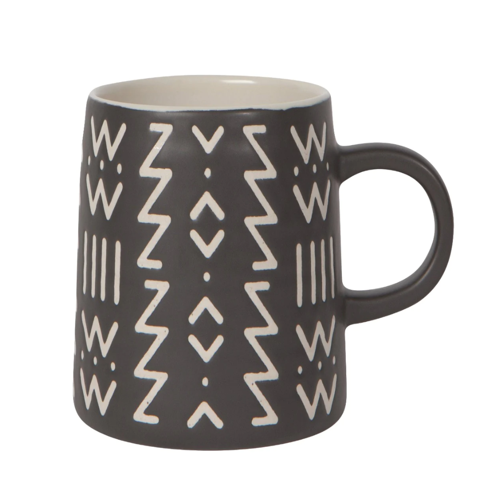 Dark grey mug with different white line and dot patterns 
