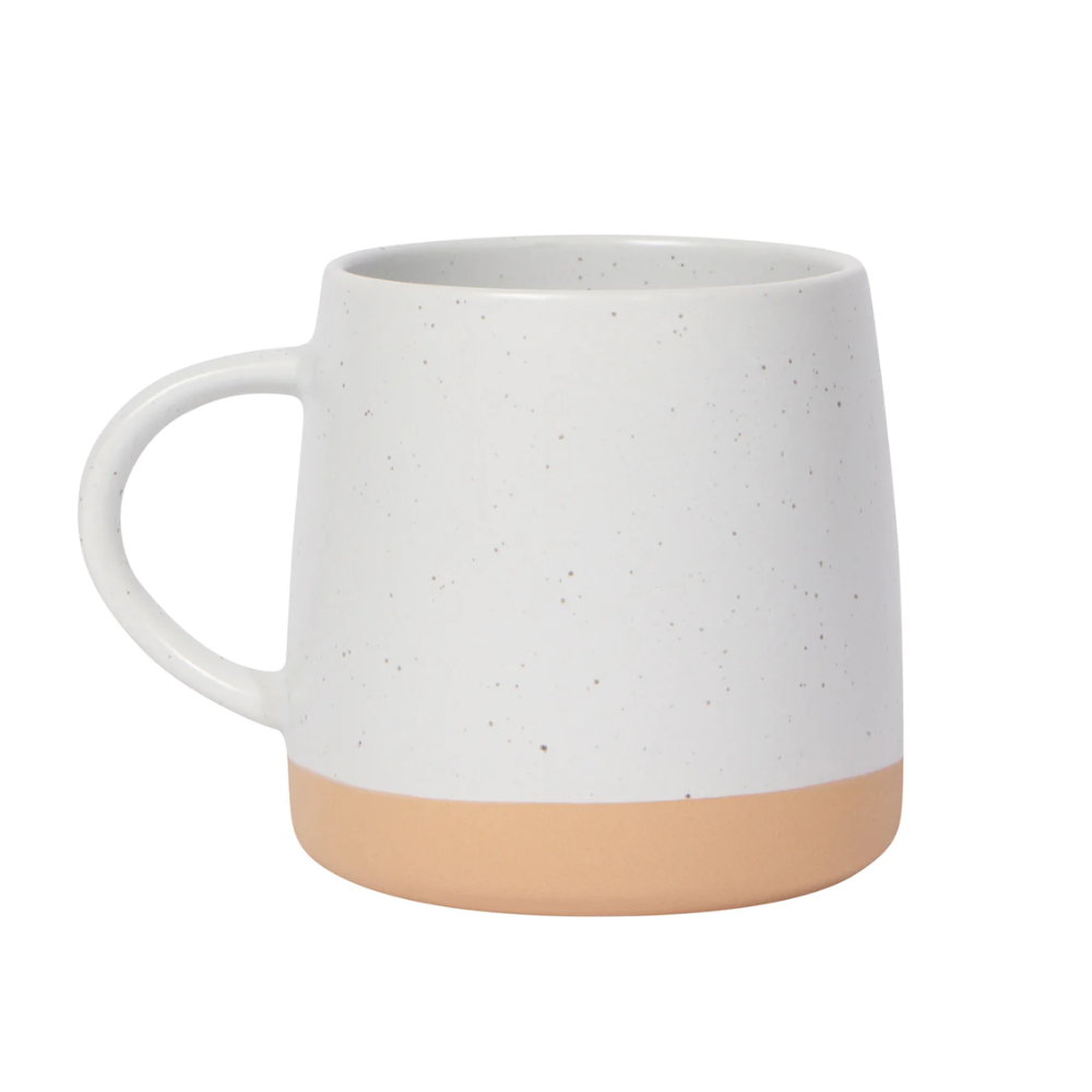 White mug with a tan bottom