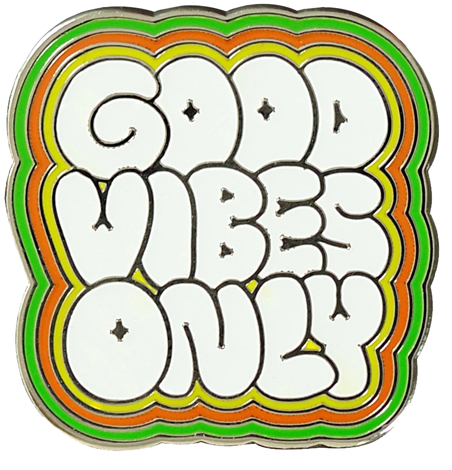 Puffy, vintage, white text that says Good Vibes Only with a green, orange, and yellow border 