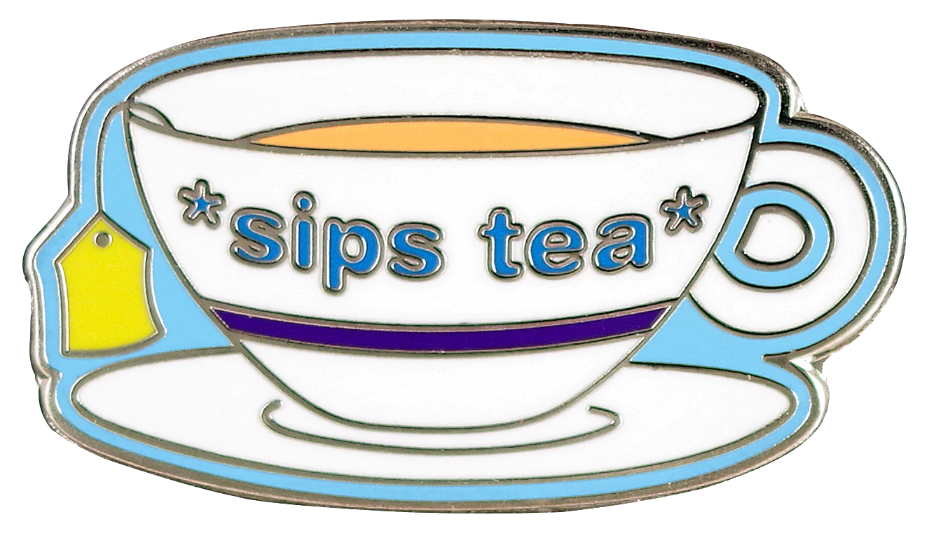 white tea glass and plate with a blue stripe, yellow tea bag label, and light blue text that says *sips tea*
