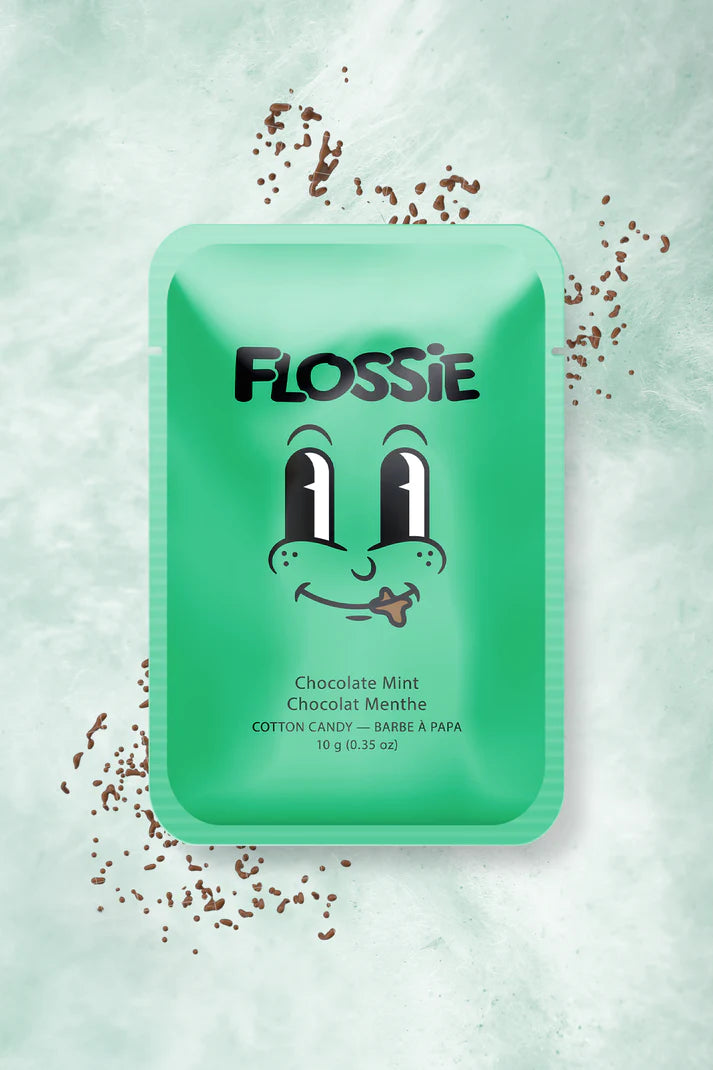 light green rectangular packaging with the text "Flossie", and a smiling cartoon face