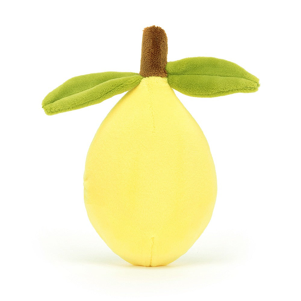 rear view of a plush light yellow lemon with green leaves and a brown stem