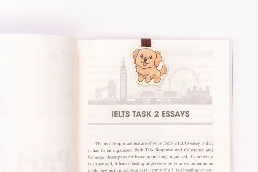 Wooden cute cartoon golden retriever on a page about essays