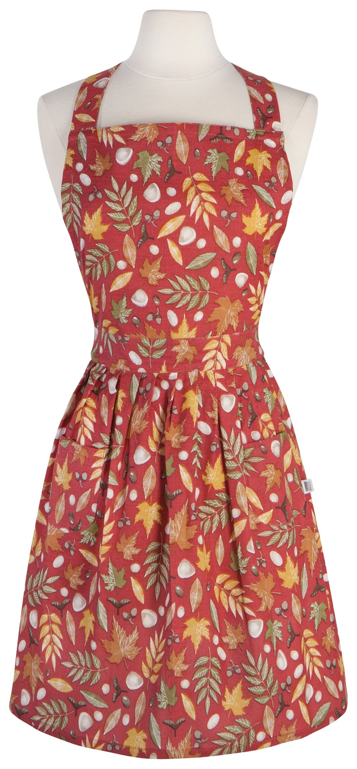 red apron with various leaves printed on it