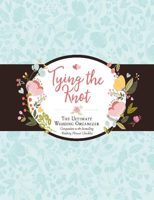 light blue book cover with a brown horizontal band, and a white circular logo with flowers around it that reads "tying the knot The ultimate wedding organizer