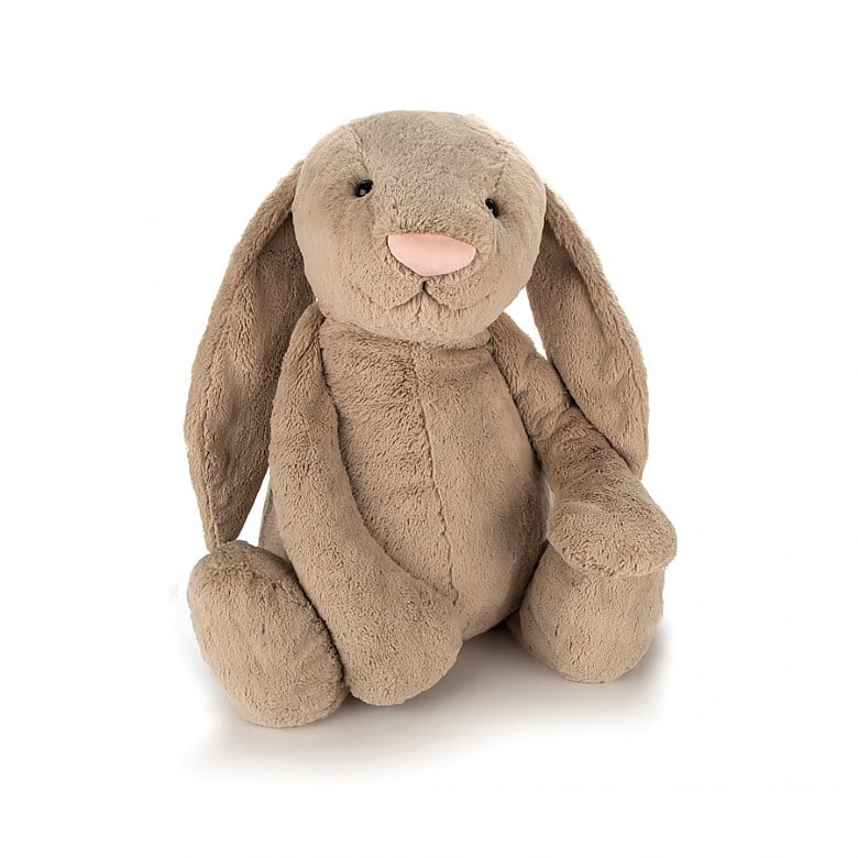 soft plush smiling light brown bunny with long floppy ears 
