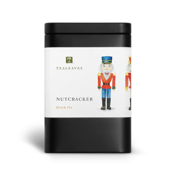 Black rectangular container with a large white label that has the tealeaves logo and product name nutcracker