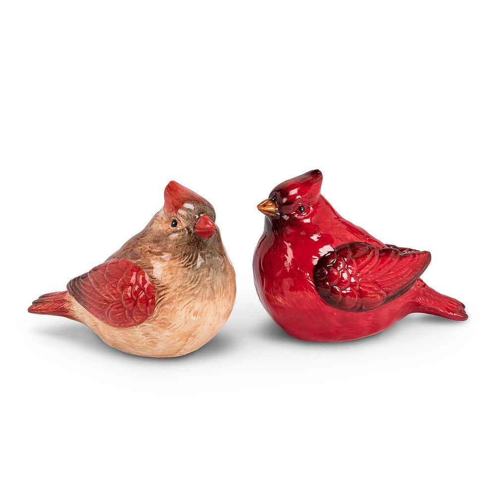 salt and pepper shakers in the shape of a male and female cardinal