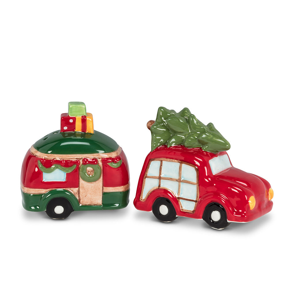 Salt and pepper shakers in the shape of a festive themed car and vintage camper trailer 