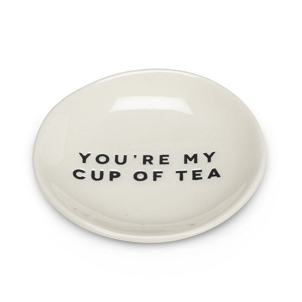 Side angle of round white dish with black modern font that says you're my  cup of tea